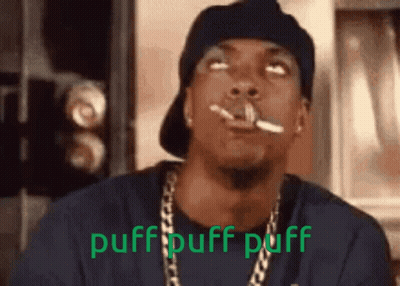 A Man Is Smoking A Cigarette With The Words Puff Puff Puff Written On The Bottom GIF