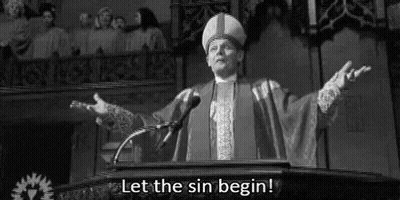 A Man Is Standing At A Podium Giving A Speech And Saying `` Let The Sin Begin ! '' GIF