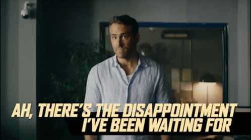 A Man Is Standing In A Dark Room With The Words Ah There 'S The Disappointment I 'Ve Been Waiting For GIF