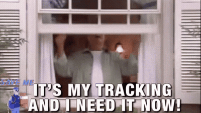 A Man Is Standing In A Doorway With The Words It 'S My Tracking And I Need It Now . GIF