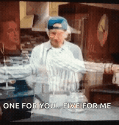 A Man Is Standing In A Kitchen With His Arms Outstretched And Says `` One For You ... Five For Me '' GIF