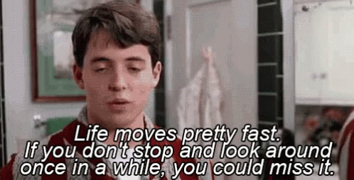 A Man Is Standing In A Kitchen With His Eyes Closed And A Quote About Life . GIF