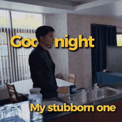 A Man Is Standing In A Kitchen With The Words Good Night My Stubborn One Behind Him GIF