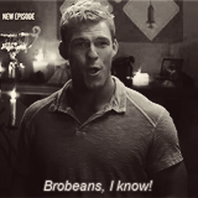 A Man Is Standing In A Room Talking To Someone And Says Brobeans , I Know . GIF