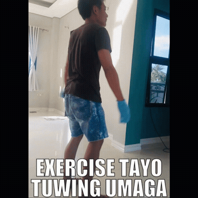 A Man Is Standing In A Room With The Words Exercise Tayo Tuwing Umaga GIF