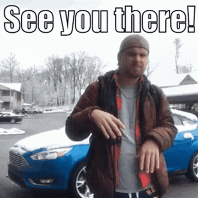 A Man Is Standing In Front Of A Blue Car With The Words `` See You There '' Written Above Him . GIF
