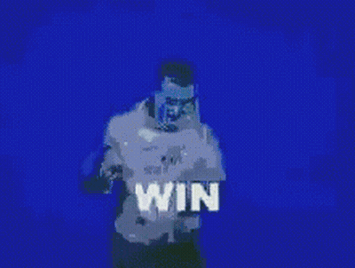 A Man Is Standing In Front Of A Blue Wall With The Word Win On It GIF