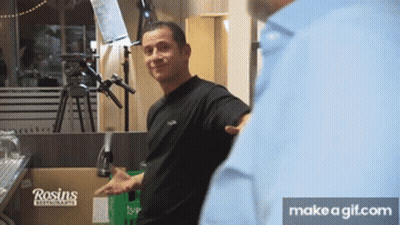 A Man Is Standing In Front Of A Box That Says Rosin 'S GIF