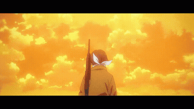 A Man Is Standing In Front Of A Building With Snow On It GIF