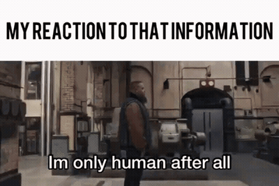 A Man Is Standing In Front Of A Building With The Words `` My Reaction To That Information Im Only Human After All '' Wr GIF