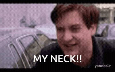 A Man Is Standing In Front Of A Car And Saying `` My Neck ! '' GIF