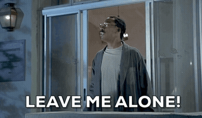 A Man Is Standing In Front Of A Door With The Words " Leave Me Alone " Written Below Him GIF