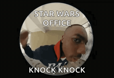 A Man Is Standing In Front Of A Door With The Words Star Wars Office Knock Knock Written On It GIF