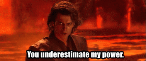 A Man Is Standing In Front Of A Fire And Says You Underestimate My Power . GIF