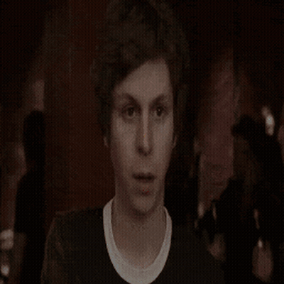 A Man Is Standing In Front Of A Fire With The Words I Gotta Written On The Bottom GIF