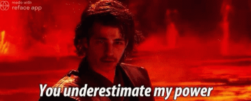 A Man Is Standing In Front Of A Fire With The Words `` You Underestimate My Power '' Written On It . GIF