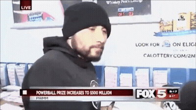 A Man Is Standing In Front Of A Fox 5 News Channel GIF
