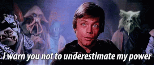 A Man Is Standing In Front Of A Group Of Monsters With The Words " I Warn You Not To Underestimate My Power " Above Him GIF