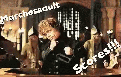 A Man Is Standing In Front Of A Group Of People With The Words Marchessault Scores Written On The Bottom Of The Image GIF