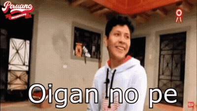 A Man Is Standing In Front Of A House With The Words " Oigan No Pe " On The Screen GIF