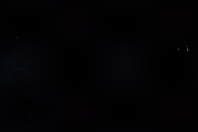 A Man Is Standing In Front Of A Motorcycle In The Fog GIF