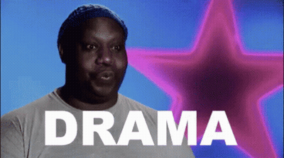 A Man Is Standing In Front Of A Purple Star And The Word Drama Is On The Screen GIF