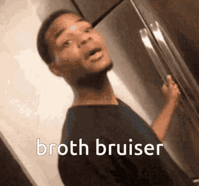 A Man Is Standing In Front Of A Refrigerator With The Words Broth Bruiser Written On The Bottom GIF
