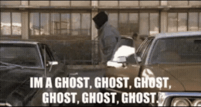 A Man Is Standing In Front Of A Row Of Cars And Says Im A Ghost Ghost Ghost Ghost GIF