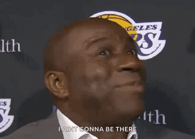 A Man Is Standing In Front Of A Sign That Says I Ain T Gonna Be There GIF