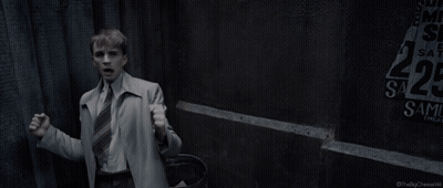 A Man Is Standing In Front Of A Sign That Says I Can Do This All Day GIF