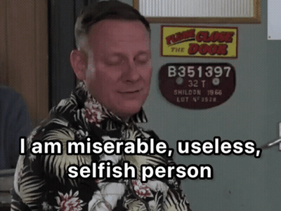 A Man Is Standing In Front Of A Sign That Says " Please Close The Door " GIF