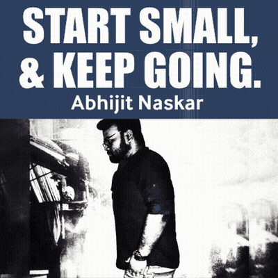 A Man Is Standing In Front Of A Sign That Says Start Small And Keep Going GIF