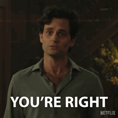 A Man Is Standing In Front Of A Sign That Says You 'Re Right GIF