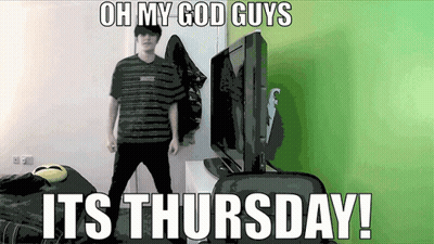 A Man Is Standing In Front Of A Tv With The Words Oh My God Guys It 'S Thursday GIF