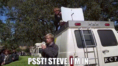 A Man Is Standing In Front Of A Van With The Words Psst Steve I 'M In Written On It GIF