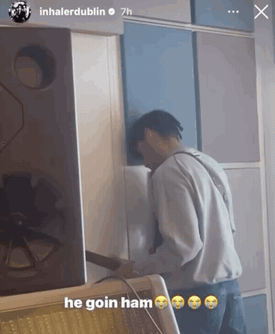 A Man Is Standing In Front Of A Wall With The Caption He Goin Ham GIF