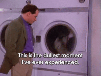 A Man Is Standing In Front Of A Washing Machine And Says This Is The Dullest Moment I 'Ve Ever Experienced GIF