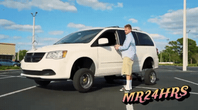 A Man Is Standing In Front Of A White Minivan That Says Mr24hrs On The Bottom GIF
