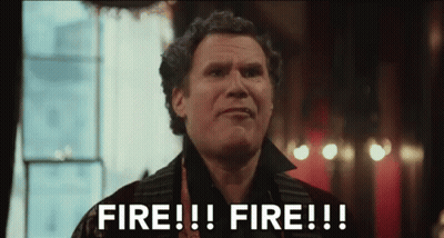 A Man Is Standing In Front Of A Window And Saying Fire !!! Fire !!! . GIF