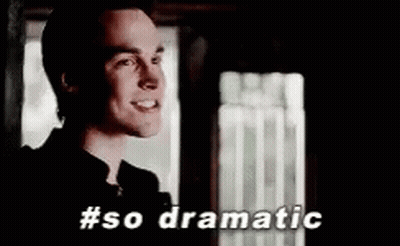 A Man Is Standing In Front Of A Window With The Words `` So Dramatic '' Written Below Him . GIF