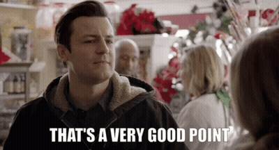 A Man Is Standing In Front Of A Woman In A Store And Says `` That 'S A Very Good Point '' . GIF