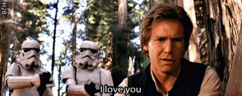 A Man Is Standing In Front Of Stormtroopers And Says I Love You GIF