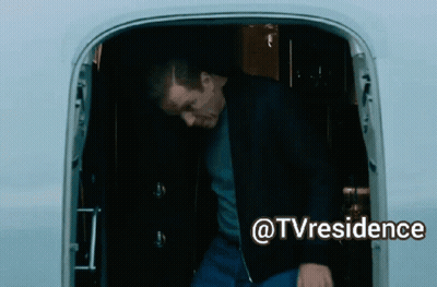 A Man Is Standing In The Doorway Of An Airplane With The Words @Tvresidence Written Below Him GIF