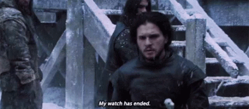 A Man Is Standing In The Snow Holding A Sword And Says `` My Watch Has Ended . '' GIF