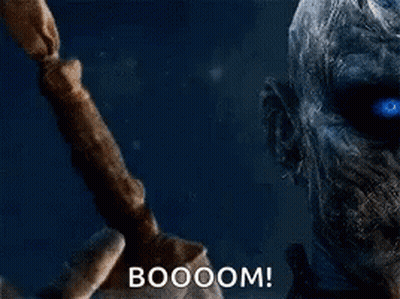 A Man Is Standing In The Water With His Arms Outstretched And The Words `` Booom '' Written On The Bottom . GIF