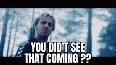 A Man Is Standing In The Woods With The Words `` You Did N't See That Coming ? '' GIF