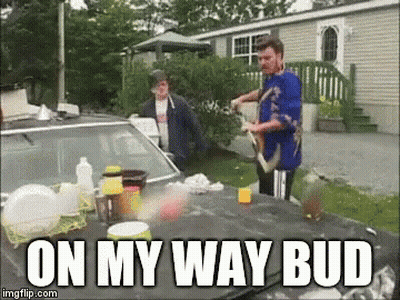 A Man Is Standing Next To A Car With The Words On My Way Bud Written On The Bottom GIF