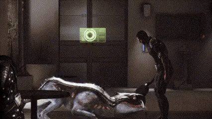 A Man Is Standing Next To A Dead Animal In A Room . GIF