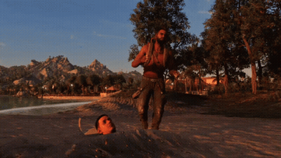 A Man Is Standing Next To A Man Buried In The Sand GIF