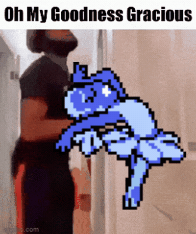 A Man Is Standing Next To A Pixel Art Of A Cat With The Words Oh My Goodness Gracious GIF